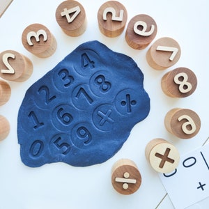 Wooden numbers and math symbols play dough stamps. Montessori-inspired learning material for toddlers and preschoolers. image 2