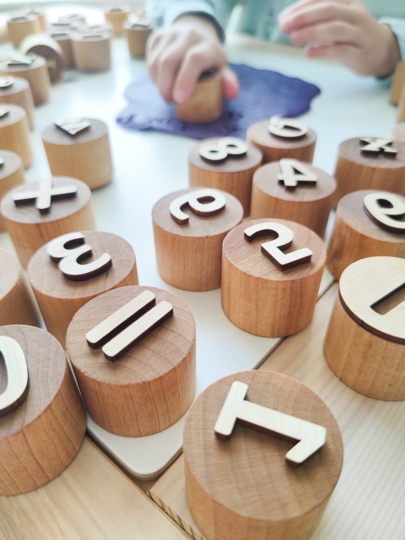 Wooden numbers and math symbols play dough stamps. Montessori-inspired learning material for toddlers and preschoolers. image 4