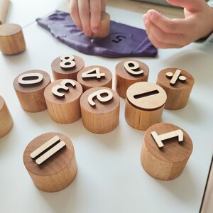 Wooden numbers and math symbols play dough stamps. Montessori-inspired learning material for toddlers and preschoolers. image 5