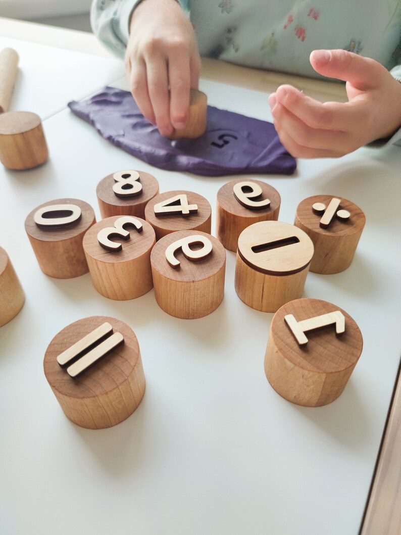 Wooden numbers and math symbols play dough stamps. Montessori-inspired learning material for toddlers and preschoolers. image 5