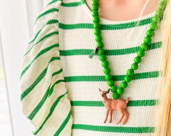 Adorable handmade wooden bead necklace with Roe Deer pendant. A charming gift for a young wild animal fan.