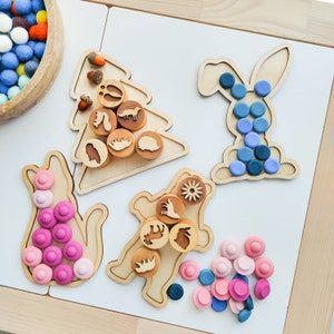 Set houten zintuiglijke sorteerbakken. Houten speelborden in diervorm. Educatief materiaal voor losse onderdelen. Benodigdheden voor de Montessori-klas.
