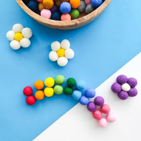 Set of 20 rainbow felt balls. Handmade felt pom poms for sensory play, nursery, and DIY school crafts. Color sorting balls for learning.