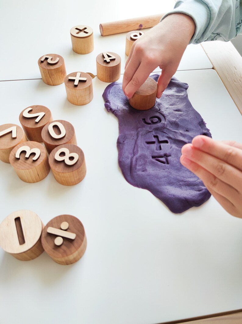 Wooden numbers and math symbols play dough stamps. Montessori-inspired learning material for toddlers and preschoolers. image 6