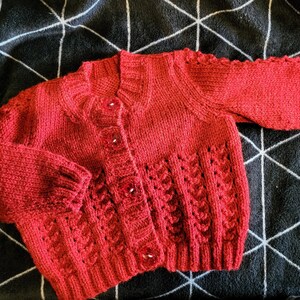 Hand knitted baby cardigan in soft dark cherry red wool in a cute pattern with matching buttons perfect for Christmas outfit image 1