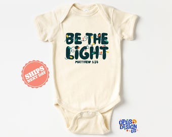 Be the Light Christmas Baby Onesie®, Retro Religious Christmas Baby Bodysuit, Jesus is the Reason Natural Baby Onesie®