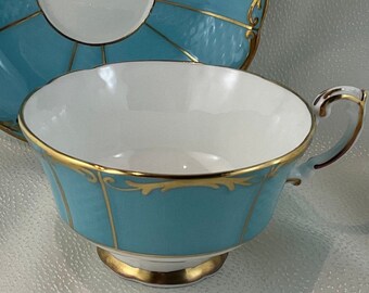 Rare! 1960’s Robins Egg Blue Paragon Teacup and Saucer Duo with Ornate Gold Scrolls Around the Rim.