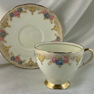 Beautiful Cream-coloured EB Foley Teacup and Saucer Duo