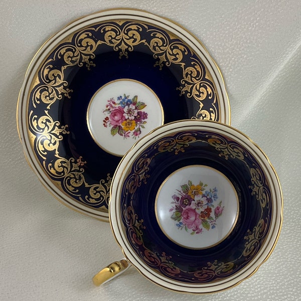 Pretty Cobalt Blue Aynsley Teacup and Saucer Embellished with Gold and with Floral Medallion