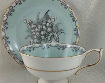 Soft Baby Blue Double Warrant Paragon Cup and Saucer Duo decorated with Lilly of the Valley, Horseshoe and “To the Bride”