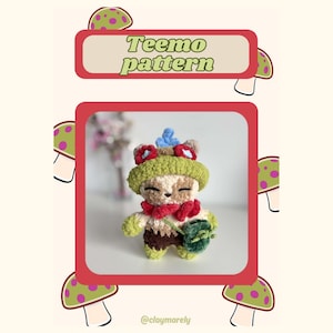 May include: A crocheted Teemo pattern doll with a green hat, red scarf, and brown shorts. The doll has a small green bag and is surrounded by mushroom graphics. The text "Teemo pattern" is displayed at the top.