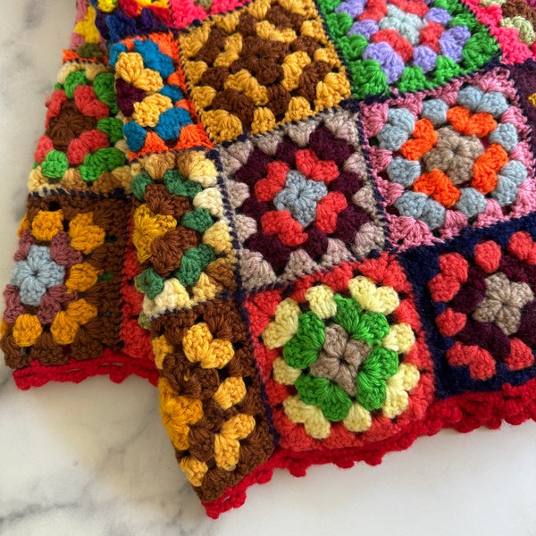 Vintage Granny Square Crocheted Throw Blanket. 35" x 50". Handmade Afghan. Multicolored with Red Trim. Lap Blanket