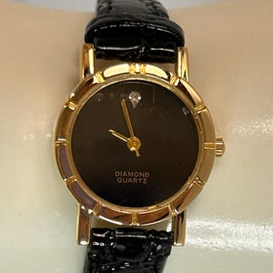 Vintage Black and Gold-tone Ladies Dress Watch with Alligator Style Leather Band and Diamond at 12