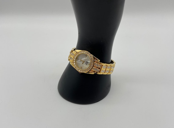 Vintage Elizabeth Taylor White Diamonds Goldtone … - image 1