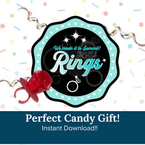 May include: A printable design for a party favor featuring a ring pop candy and a blue and black circle with the text "We made it to Summit! Now let's get those Rings". The text "Perfect Candy Gift! Instant Download!!" is at the bottom of the image.