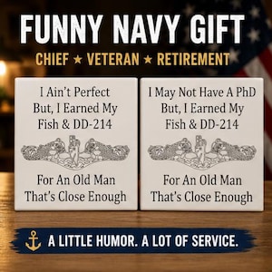 May include: Two square ceramic tiles with humorous text and a navy emblem. The tiles read "I Ain't Perfect But, I Earned My Fish & DD-214" and "I May Not Have A PhD But, I Earned My Fish & DD-214". The text "For An Old Man That's Close Enough" is also present.