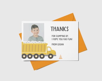 May include: A thank you card with a photo of a young boy and a cartoon dump truck. The card says "Thanks for dumping by, I hope you had fun! From Logan."