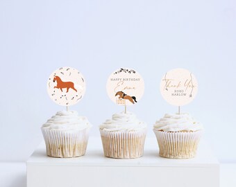 May include: Three cupcakes with white frosting and brown horse-themed cupcake toppers. The toppers say "Happy Birthday Emma", "Thank You XOXO Harlow", and a brown horse running.