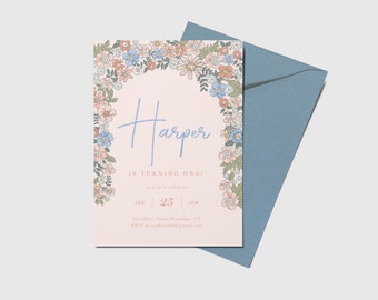 May include: A pink floral birthday invitation for Harper's first birthday party. The invitation features a floral border with blue, pink, and green flowers. The text reads "Harper is turning one!" and includes the date, time, and location of the party.