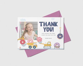 May include: A thank you card with a photo of a young girl smiling. The card has a construction theme with yellow trucks and donuts. The text on the card reads "Thank You! For joining the crew, I hope you had fun too! From Rosie."