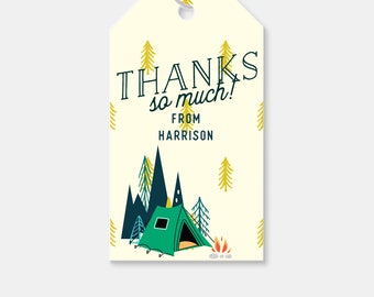 May include: A cream-colored gift tag with a camping theme. The tag features a green tent, a campfire, and stylized trees. The text "THANKS so much! FROM Harrison" is printed in a dark teal font.