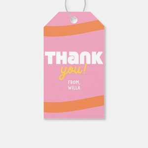 May include: Pink and orange striped thank you gift tag with the text "Thank you!" in white and "From, Willa" in black.