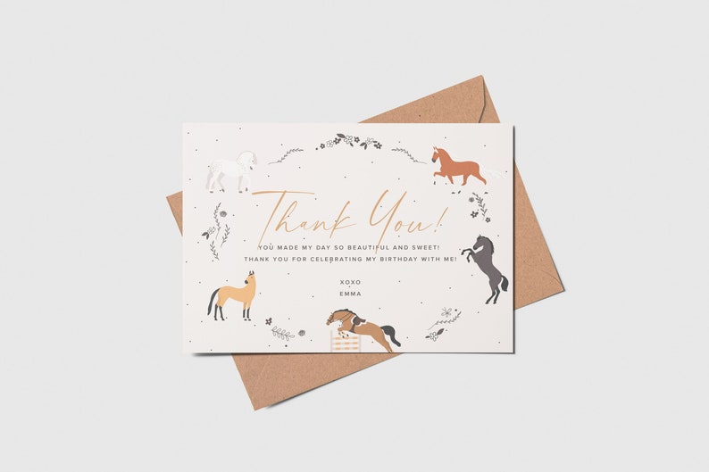 May include: Thank You! card with a white background and a gold handwritten thank you message. The card is decorated with a floral wreath and five horses in different colors and poses. The text on the card reads "You made my day so beautiful and sweet! Thank you for celebrating my birthday with me! XOXO Emma"