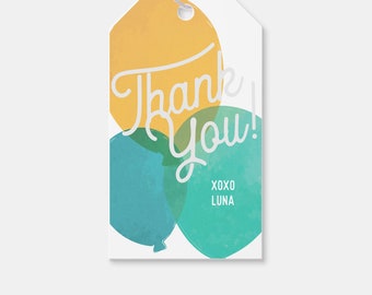 May include: Thank You! gift tag with watercolor-style balloons in yellow, teal, and green. The text "Thank You!" is in white cursive font. The tag also includes the text "XOXO LUNA" in white font.