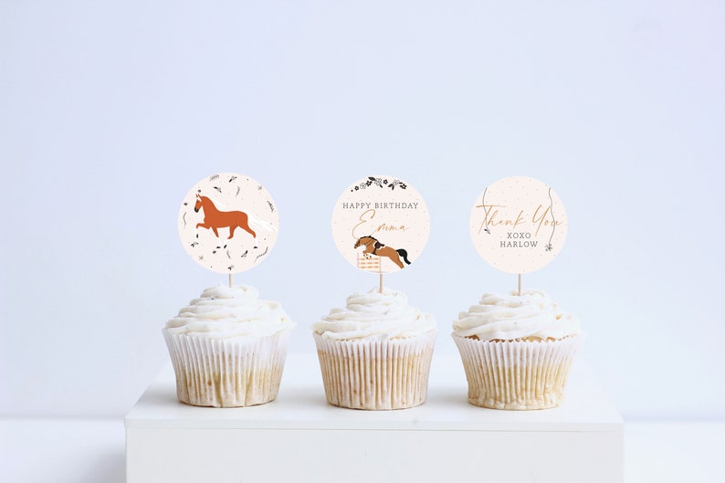 May include: Three cupcakes with white frosting and brown horse-themed cupcake toppers. The toppers say "Happy Birthday Emma", "Thank You XOXO Harlow", and a brown horse running.