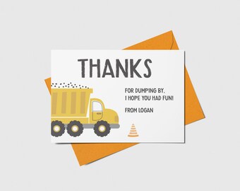 May include: A yellow dump truck with black wheels and a gray cab. The truck is filled with black dirt. The text "THANKS FOR DUMPING BY, I HOPE YOU HAD FUN! FROM LOGAN" is printed on the card.