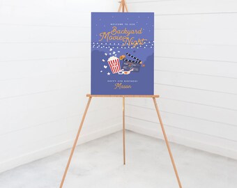 May include: A purple welcome sign with white stars and string lights. The sign says "Welcome to our Backyard Movie Night" and "Happy 4th Birthday Mason". There is a cartoon image of popcorn, 3D glasses, and a movie clapper.