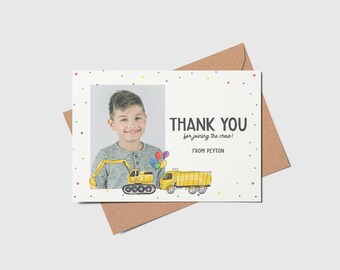 May include: A thank you card with a photo of a young boy holding a toy excavator. The card has a white background with colorful confetti and the text "THANK YOU for joining the crew! FROM PEYTON".