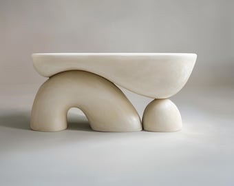 Sculptural console table in beige Tadelakt plaster