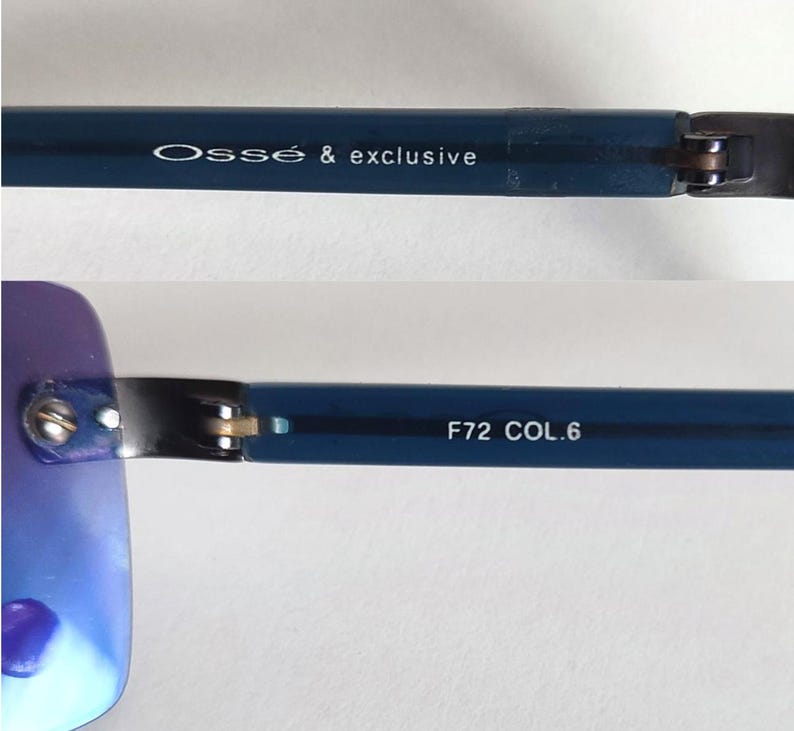 May include: Close-up of blue-framed sunglasses. The text "Oss&eacute; & exclusive" is printed on the temple. The other temple has the text "F72 COL.6". The lenses have a gradient blue hue.