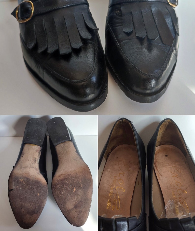 May include: Black leather loafers with fringe detailing and gold-tone buckles. The shoes have a classic design with a rounded toe and a low heel. The soles show wear, indicating they are pre-owned.