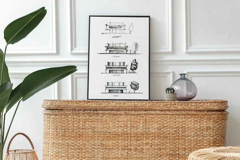 May include: Black and white line drawing of a house with four different floor plans. The drawing is framed and hanging on a white wall above a woven wicker chest.