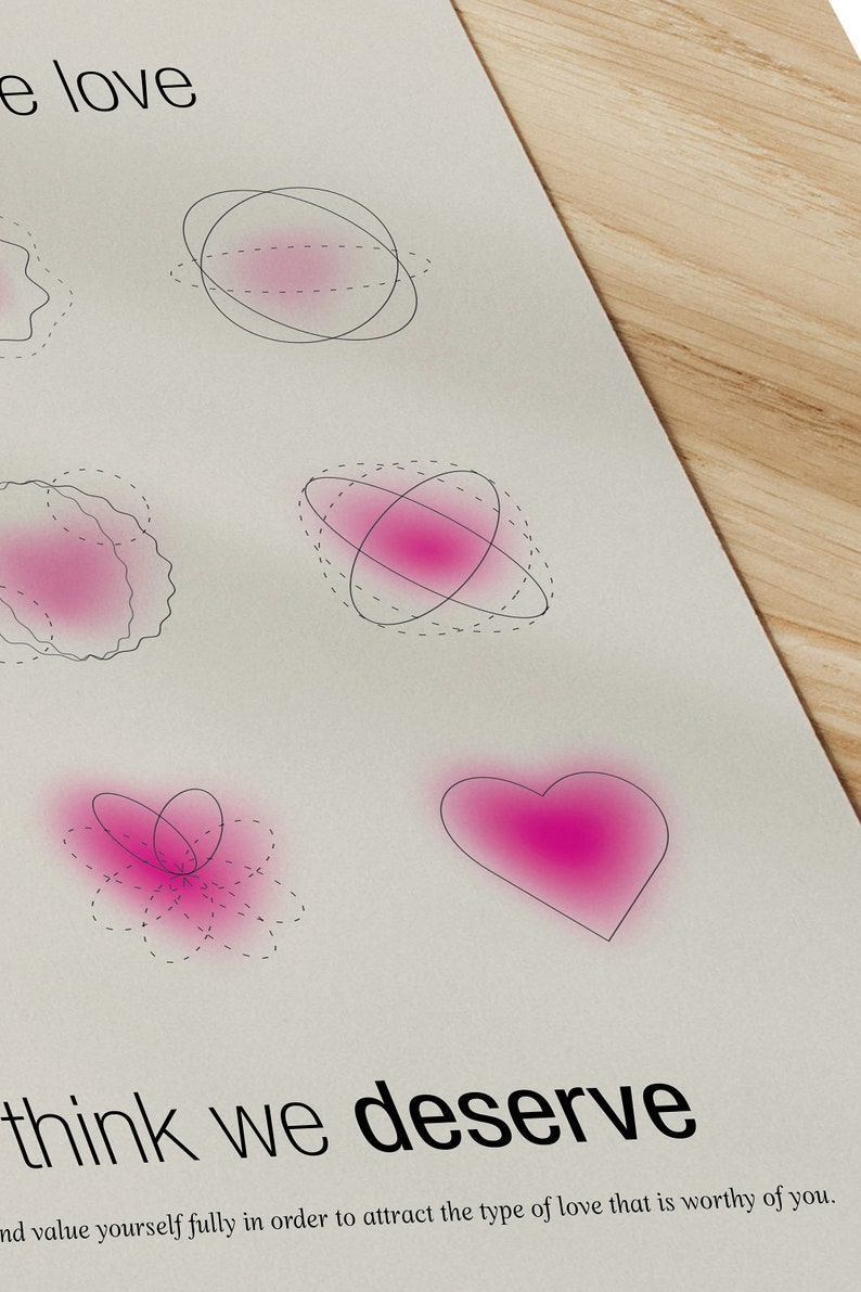 May include: A white print with abstract pink shapes and the words "think we deserve" in black. The print features various designs, including a heart and other geometric forms, with the text "e love" at the top.