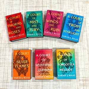 May include: A collection of seven books by Sarah J. Maas, including A Court of Thorns and Roses, A Court of Mist and Fury, A Court of Wings and Ruin, A Court of Frost and Starlight, A Court of Silver Flames, A Court of Splintered Harmony, and A Court of Forgotten Melody.