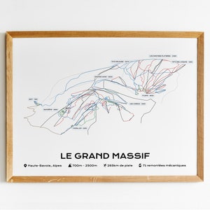 May include: A black and white map of the Le Grand Massif ski resort in the Haute-Savoie region of the French Alps. The map shows the different ski runs and lifts, as well as the elevation of the different peaks. The map also includes the text "Le Grand Massif", "700m - 2500m", "265km de piste", and "71 remontées mécaniques".