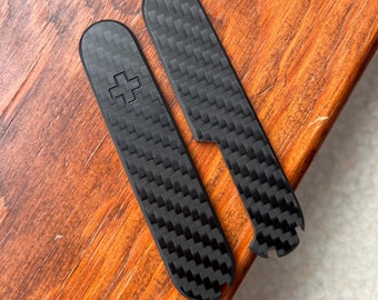 Victorinox 91mm/91mm plus Carbon Scales