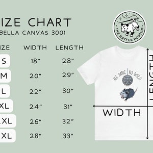 K&ouml;nnte beinhalten: Gr&ouml;&szlig;entabelle f&uuml;r Bella Canvas 3001 T-Shirts. Die Tabelle zeigt die Breite und L&auml;nge in Zoll f&uuml;r die Gr&ouml;&szlig;en S, M, L, XL, 2XL und 3XL.