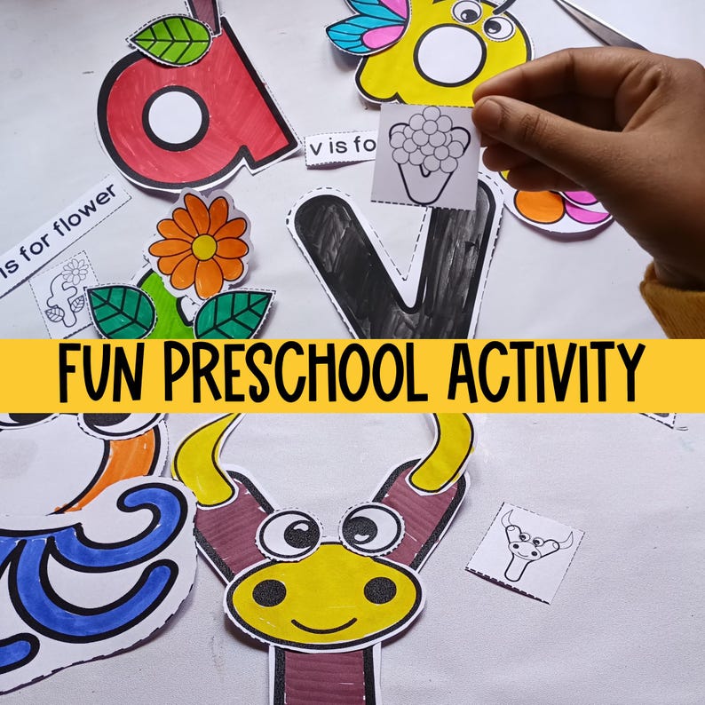 May include: A fun preschool activity with colorful cut-out letters and pictures. The letters are V, A, and F. The pictures include a flower, a butterfly, a bull, and grapes. The text "V is for flower" is visible on a white card.