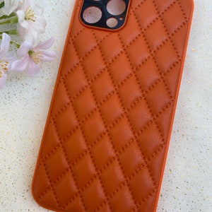 Dark pink Louis Vuitton embossed leather & diamond phone wallpaper