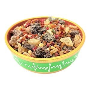 May include: A ceramic bowl filled with a mix of colorful, textured incense resins and herbs. The bowl has a green exterior with a white wave pattern, a gold rim, and a reddish-brown interior. The contents include various shades of brown, red, and green.
