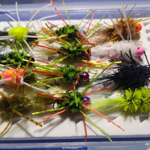 12 pack tungsten pitching jigs with or without fly box.    SIZE 10- Starky's favorite collection.