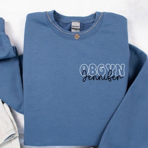 Personalized OBGYN Sweatshirt, Custom OBGYN Sweatshirt, Obstetrics Nurse Crewneck, Registered Nurse Grad Gift, Nurse Appreciation