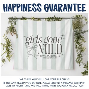 May include: A white and green striped fabric backdrop with the text "girls gone MILD" in gray. The text "Jenna's Bachelorette Asheville August 2024" is also in gray below the main text.