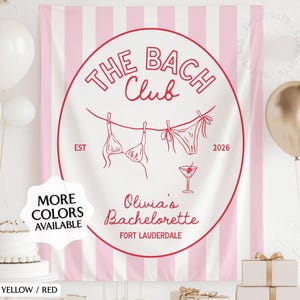 May include: A white and pink striped backdrop with a red circular design. The design includes the text "THE BACH Club" and "Olivia's Bachelorette FORT LAUDERDALE 2026". The image also shows a cake, balloons, and gift boxes.