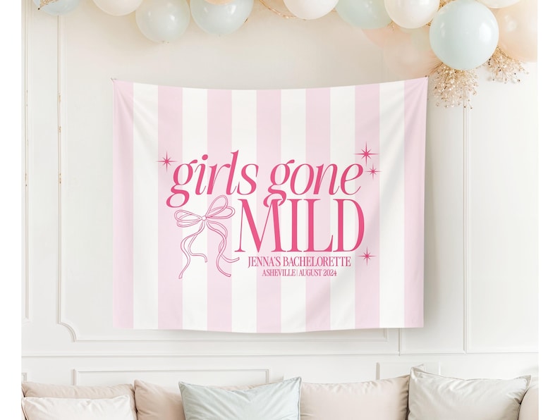 May include: Pink and white striped backdrop with the text "girls gone wild" in pink lettering. The text "Jenna's Bachelorette Asheville | August 2024" is also included in pink lettering.