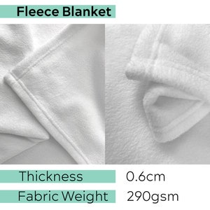 May include: Close-up of a white fleece blanket showing the texture and thickness. The blanket is 0.6 cm thick and weighs 290 gsm.